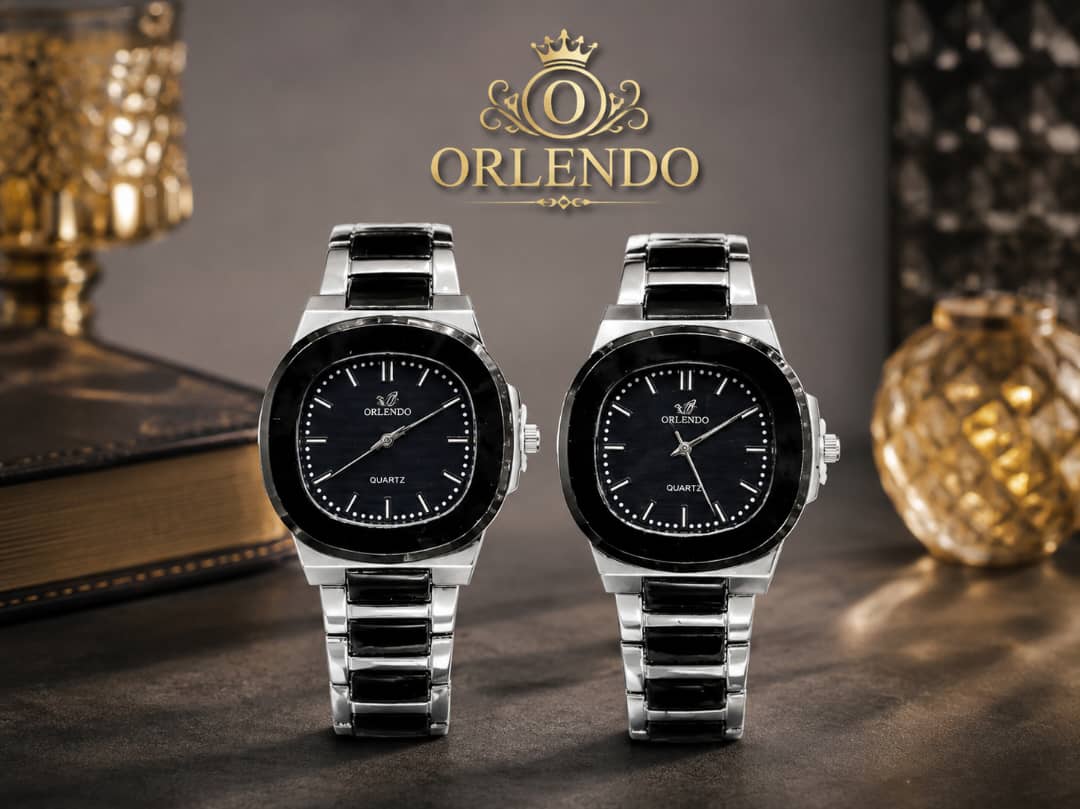 Two identical Orlendo cushion-case silver and black stainless steel quartz watches standing side-by-side.