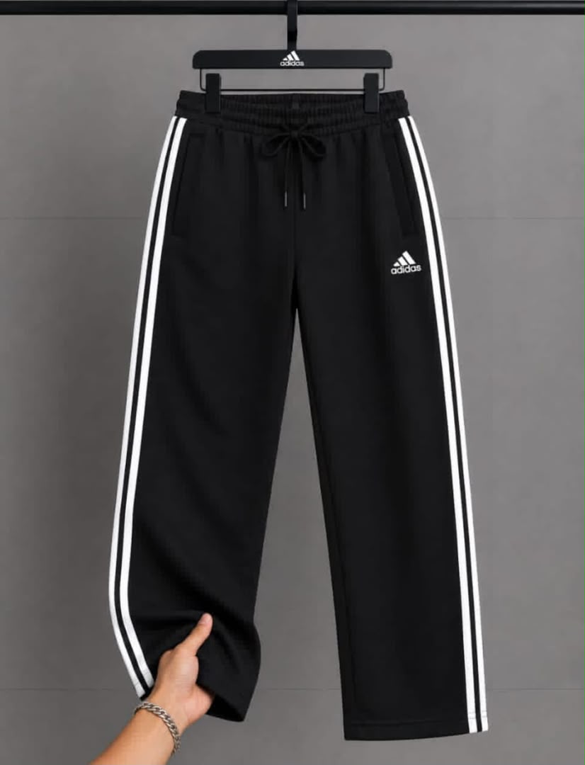 Maroon Adidas Track Pants Classic black Adidas athletic track pants with white 3-stripes and elastic waist.