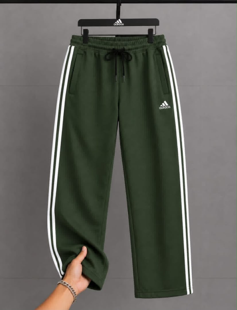 Maroon Adidas Track Pants Dark green Adidas athletic track pants with white 3-stripes and pockets.